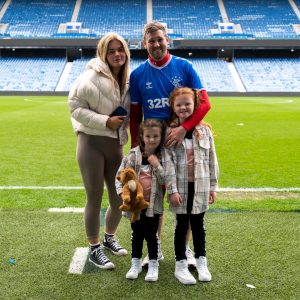three girls and their dad at Ibrox